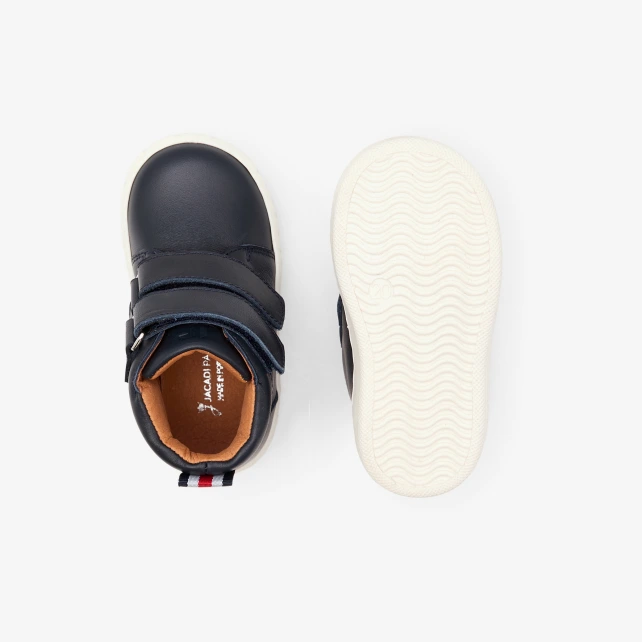 Tennis montantes bébé en cuir lisse