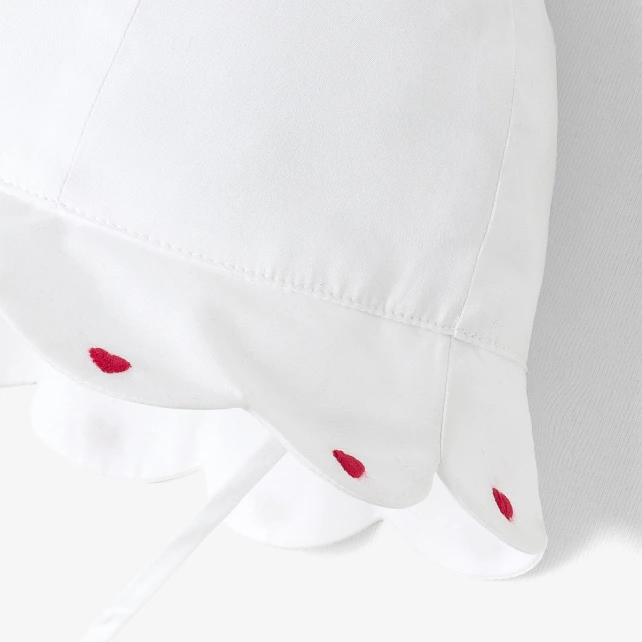 Chapeau bébé fille en coton à bord festonné